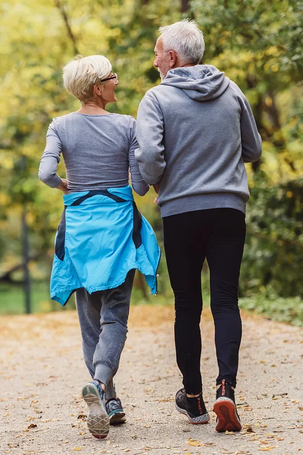Abdominal-Weight-Loss-Treatment An older couple on a power walk. Get abdominal weight loss treatment from Healthy Aging Medical Centers of New Jersey in Northern New Jersey.