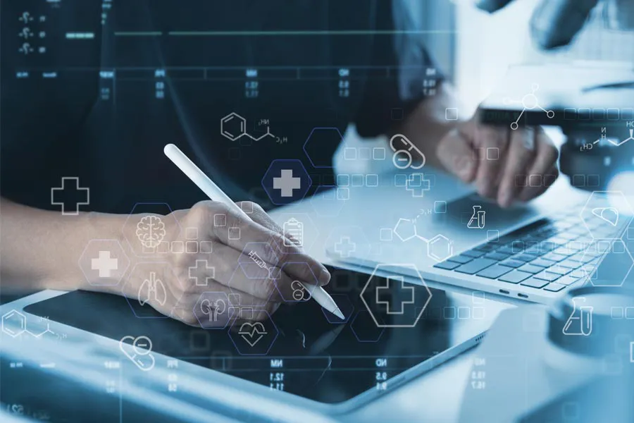 Health-Conditions-Treated-Doctor Close-up of a medical professional using a laptop and tablet, with illustrated medical symbols overlayed on the image, symbolizing health conditions treated by Healthy Aging Medical Centers of New Jersey in Northern New Jersey.