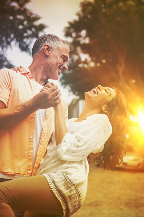 Ozempic-Treatment A middle-aged couple dancing at sunset. Get a consultation about Ozempic from Healthy Aging Medical Centers of New Jersey in Northern New Jersey.