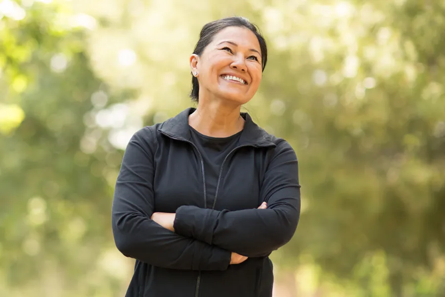 Post-Surgical-Weight-Loss-Clinic A middle-aged asian woman in track clothes. Get post-surgical weight loss treatment from Healthy Aging Medical Centers of New Jersey in Northern New Jersey.