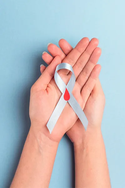 Type-2-Diabetes-Treatment A woman holds a diabetes ribbon. Get Type 2 Diabetes treatment from Healthy Aging Medical Centers of New Jersey in Northern New Jersey.